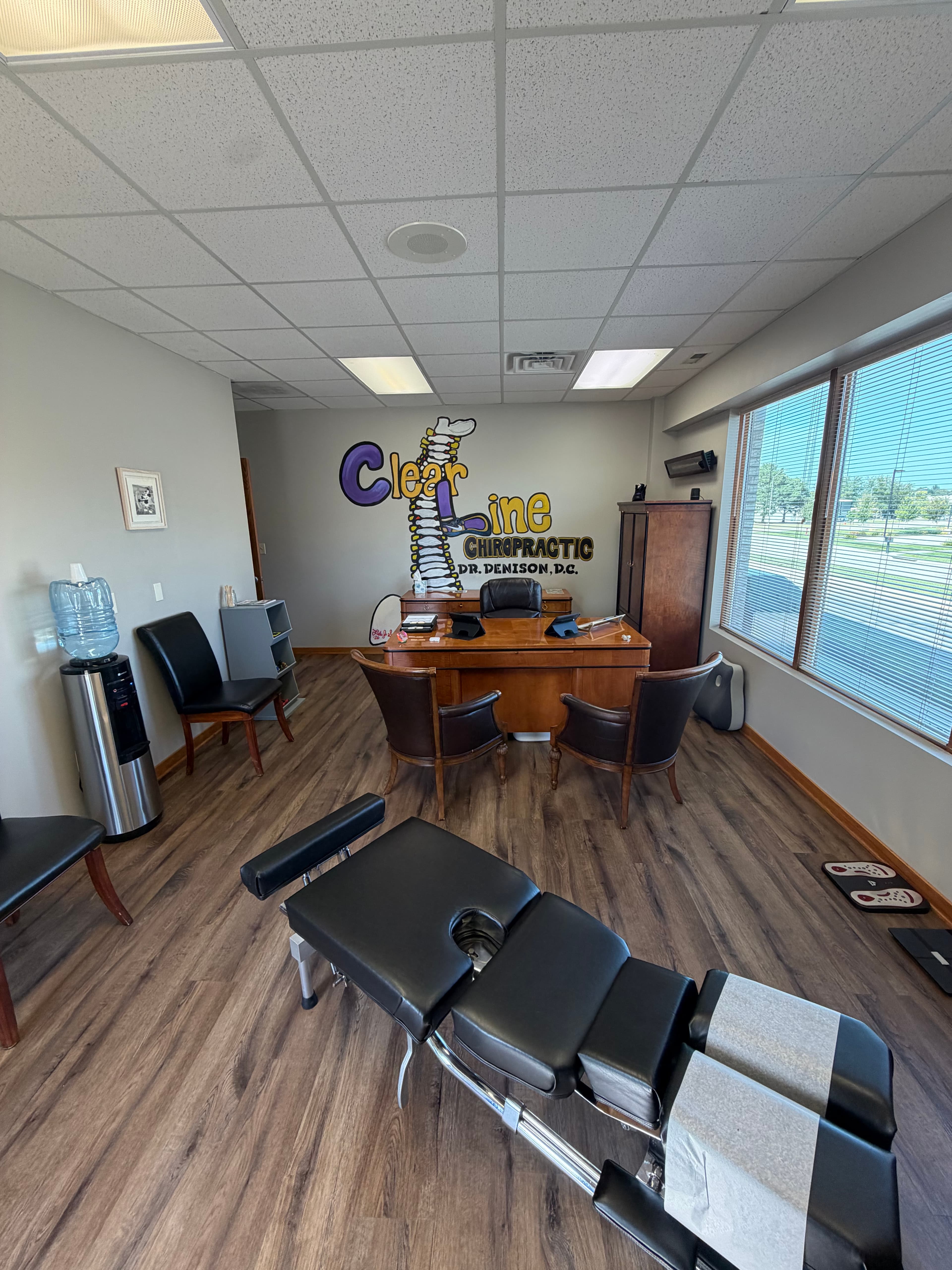 Adjusting table in the ClearLine Chiropractic treatment room